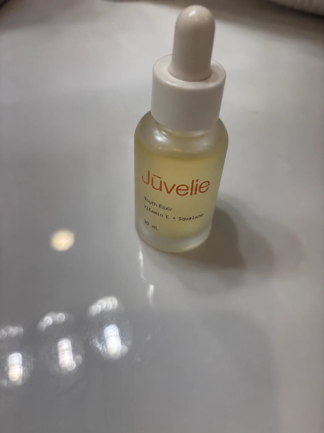 Youth Elixir on an everyday bathroom basin